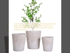 neutral beige round fiber clay planter with honeycomb design pattern lightweight durable low-maintainence flower pot holiday Villa hotel shopping mall office decoration garden landscaping project