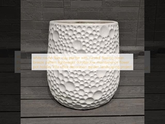 white round fiber clay planter with curved, flowing ocean breeze pattern lightweight durable low-maintainence flower pot holiday Villa office decoration garden landscaping project