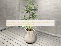 light grayish - white repetitive geometric pattern round fiber clay planter architectural landscaping design