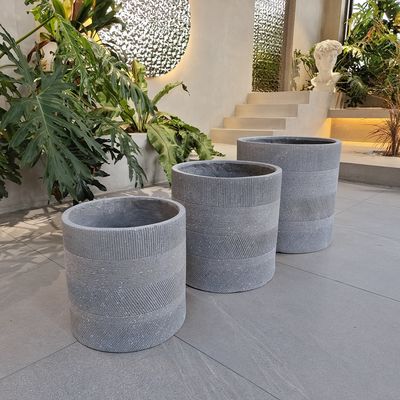 Buy Hand Carve Finishing Fiber Clay Planter D300*H270 With Drainage Holes online manufacture