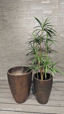 Buy Bronze - Brown Irregular Flowing Wave Round Fiber Clay Planter online manufacture