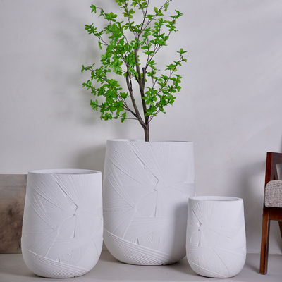 neutral white round fiber clay planter with radial geometric pattern lightweight durable low-maintainence flower pot holiday Villa hotel shopping mall office decoration garden landscaping project