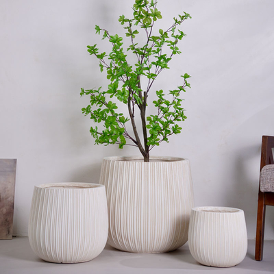 neutral beige round fiber clay planter with vertical ribbed pattern lightweight durable low-maintainence flower pot holiday Villa hotel shopping mall office decoration garden landscaping project